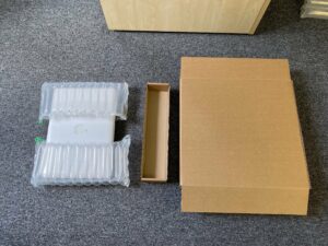 MacBook inside inflatable bags with shipping box